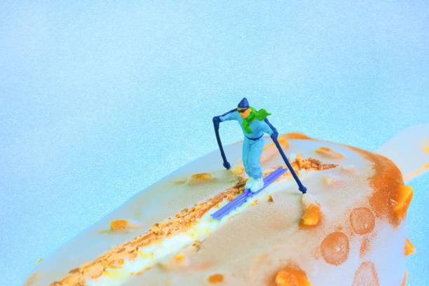 skier rides down on a chocolate popsicle, blue background