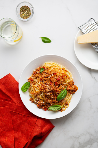 Top view of italian pasta spaghetti bolognese in bowl