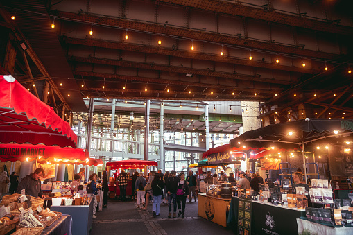 Shoppers visit the public marketplace, known as the Nave, at the historic Ferry Building in downtown San Francisco. Opened in 1898, the landmark building is a terminal for San Francisco Bay ferries and a farmers market.