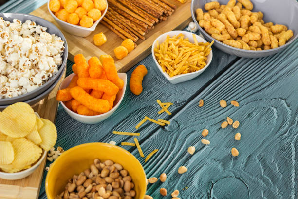 istock Beer salty snacks on wooden table 1437308494