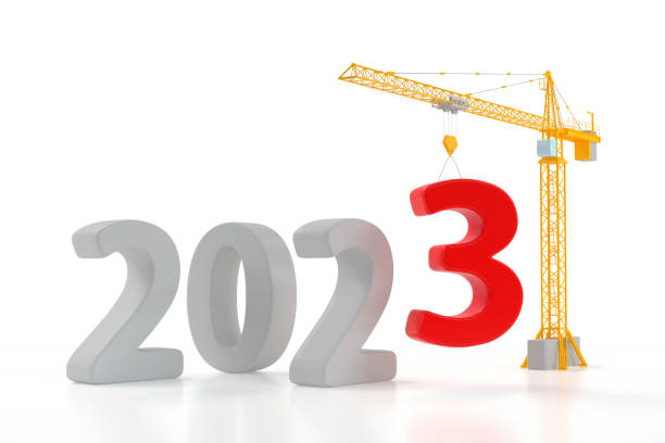istock Build the Future Concept. Tower Crane with 2023 Year Sign on a white background. 3d Rendering 1437311072