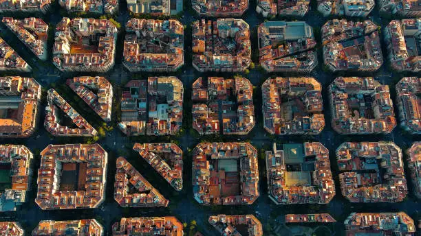 The grid was created by Ildefons Cerda a Spanish architect to solve Barcelona's health and overcrowding problems of the 19th century.