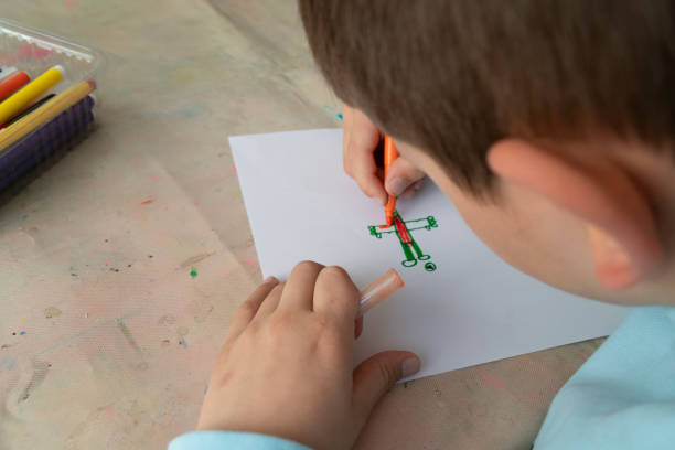 Little boy painting