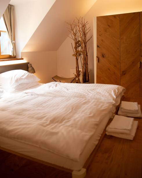 istock Bed in the hotel room 1437321279