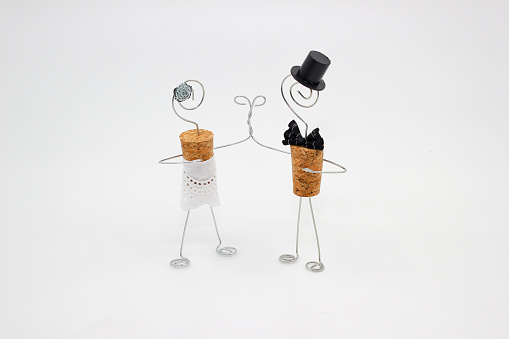 Wedding figurines symbolizing Mr. and Mrs. horizontal image