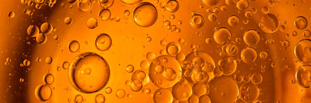 istock Yellow bubbles background, cooking oil emulsion, frying. 1437345134