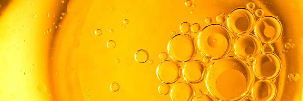 istock Yellow bubbles background, cooking oil emulsion, frying. 1437346058