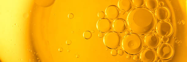istock Yellow bubbles background, cooking oil emulsion, frying. 1437346059
