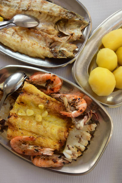 Portuguese Mixed Grilled Seafood Dinner stock photo