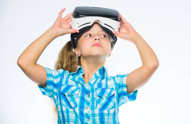 istock Child play virtual games with modern device. Explore virtual opportunity. Newest kids virtual reality games. Virtual reality is fun for all ages. Kid girl with vr glasses. Little gamer concept 1437350573
