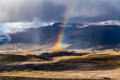 Rainbow at sunset in Cotopaxi national park.
