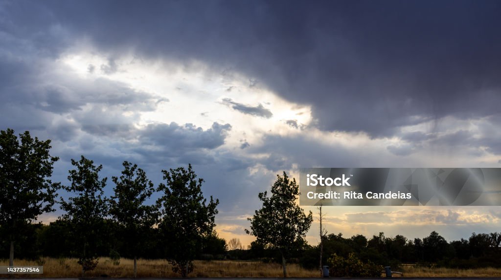 First Storm First end of summer storm on a Spanish field Agricultural Field Stock Photo