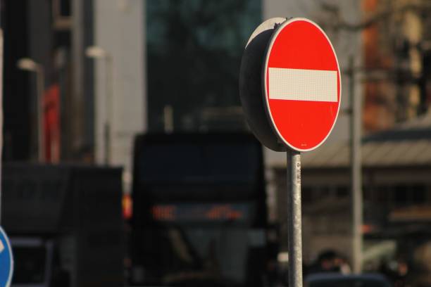istock Red stop sign in the street 1437362678