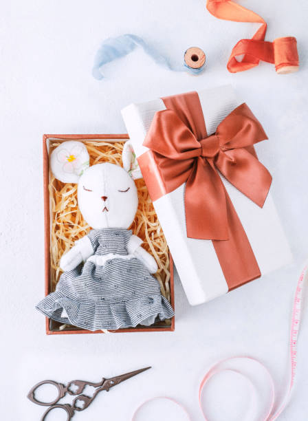 istock homemade sewn soft toy mouse in a gift box 1437365342