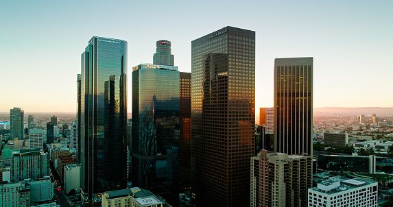 Aerial shot of the financial district  Downtown Los Angeles (DTLA) at sunset.