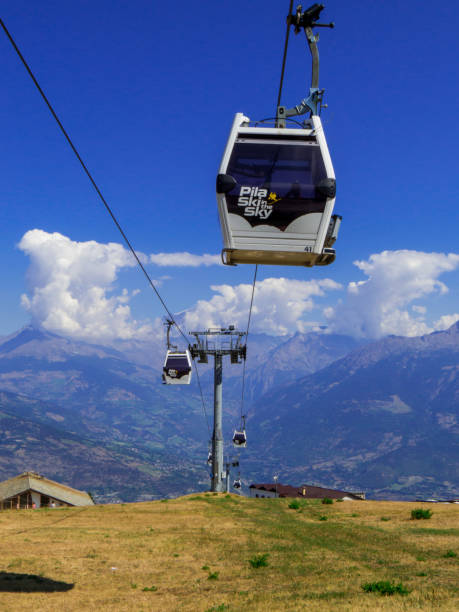 Aosta-Pila Cable Car Aosta, Italy - August 4, 2022: View of the Aosta-Pila cable car. pila stock pictures, royalty-free photos & images