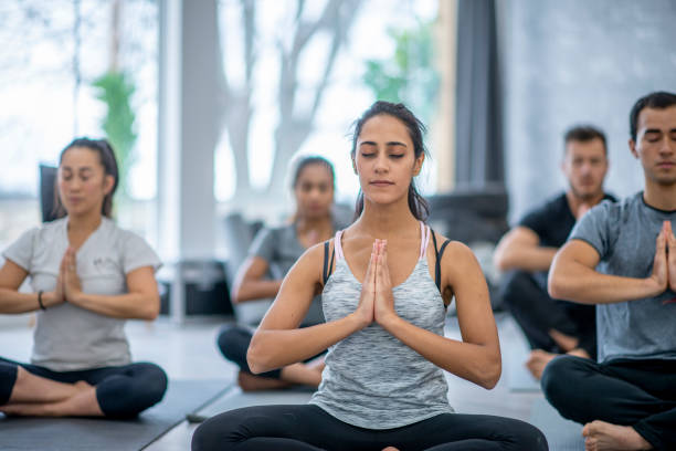 istock Mature Adult Yoga Class 1437379050