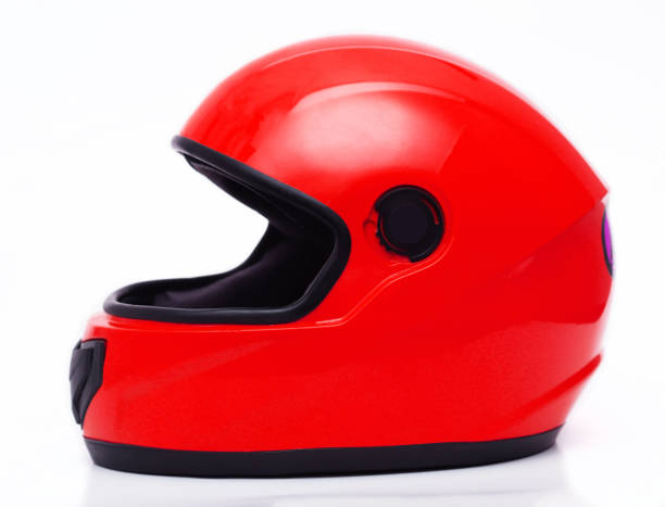 istock Car helmet in red color on a white background. Close-up 1437383366