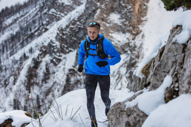 istock A Fit Caucasian Trail Runner Bounds Up Mountain Trail 1437392288