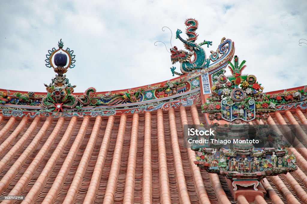 Partial view of a detailed Chinese temple rooftop Partial view of a detailed Chinese temple rooftop. Penang Above Stock Photo