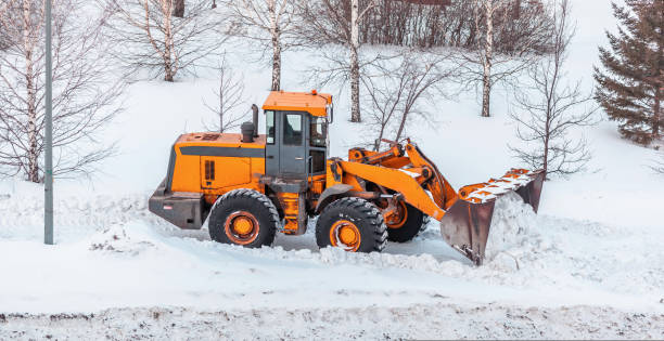 istock Snow clearing. Tractor clears the way after heavy snowfall. 1437416839