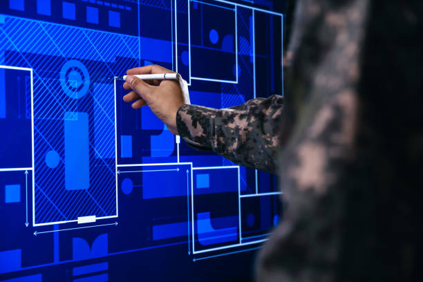istock Hand of soldier pointing to building plan management. 1437419892