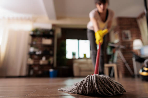 istock Housemaid cleaning floor with mop 1437423173