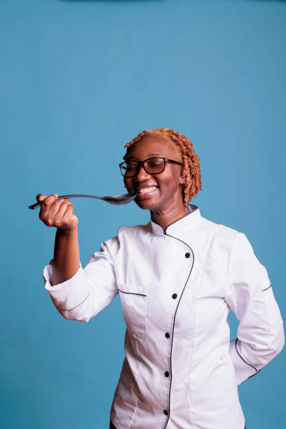 istock Smiling cooking professional wearing chef jacket 1437426448