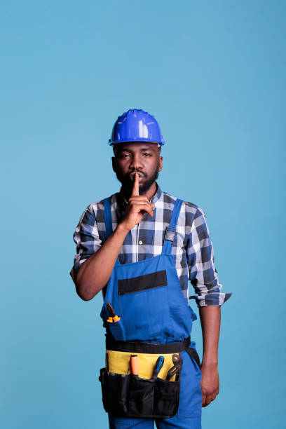 istock Electrician making the gesture of silence 1437427635