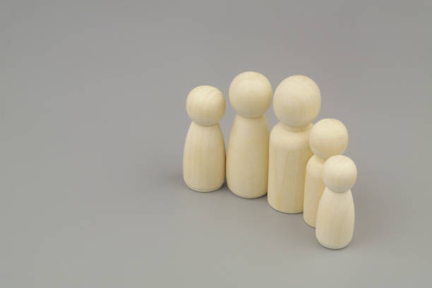 istock Family people figures on gray background with space for text. 1437428446
