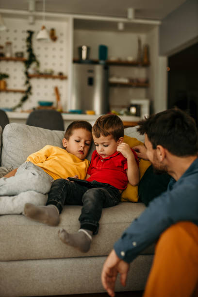 istock Strict father scolding lecturing naughty stubborn little son 1437428599