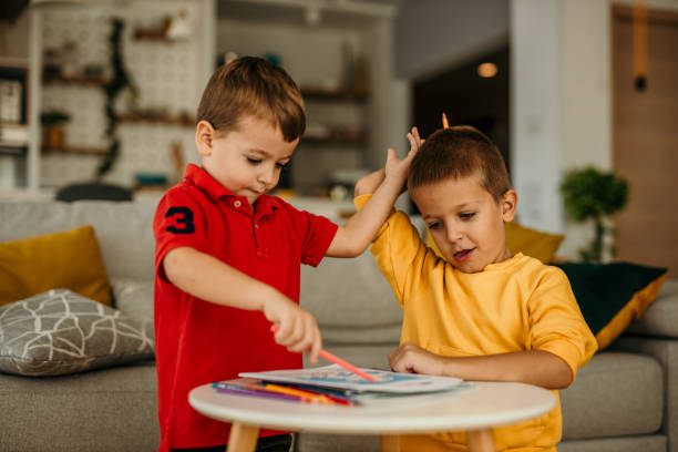 istock Boy brothers drawing and playing together 1437428688