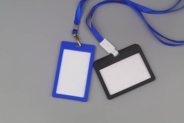 istock Blue and black badges with blue ribbons on gray background 1437436897