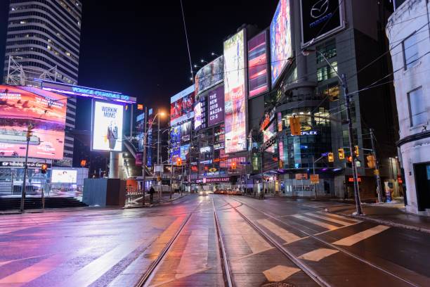 Night in Toronto Toronto, Canada – January 18, 2018: Night view of the Yonge-Dundas Square, also known as Times Square of Toronto toronto dundas square stock pictures, royalty-free photos & images