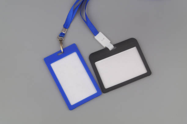 istock Blue and black badges with blue ribbons on gray background 1437437404