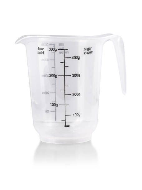 istock Plastic Transparent kitchen measuring cup isolated on white 1437439881
