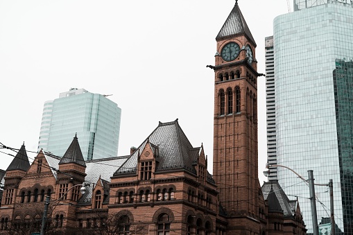 The Toronto Old City Hall on the background of skyscrapers, Canada
