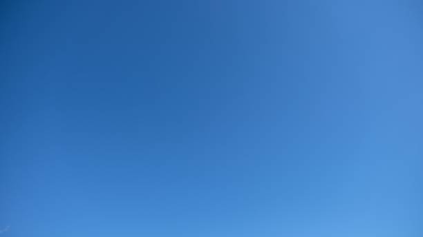 istock Low angle shot of an absolutely clear blue sky 1437450691