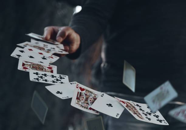 istock Man throwing the white various cards in the air 1437451147