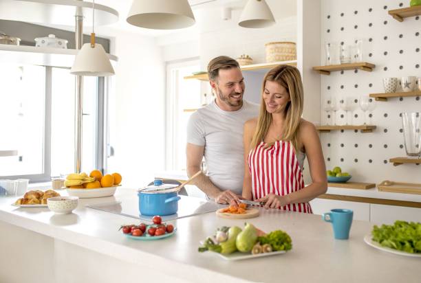 istock Adorable cooking something in the kitchen with each other 1437451297