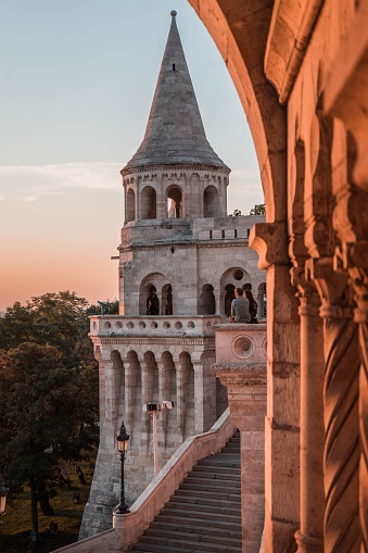 The exterior design of the fortress of Fisherman's Bastion and tourists visiting it in Budapest, Hungary