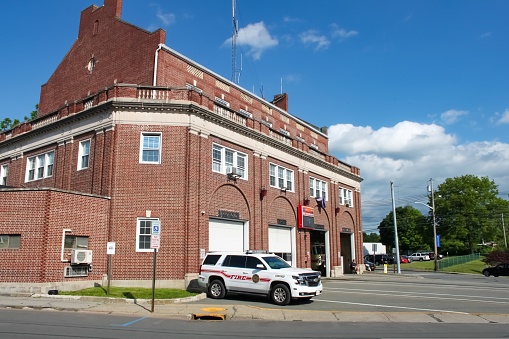 Middletown, NY, United States – June 03, 2020: Middletown, NY / USA - 06/03/2020: Middletown Fire Department, Fire Station Building Exterior with Fire Chief Vehicle