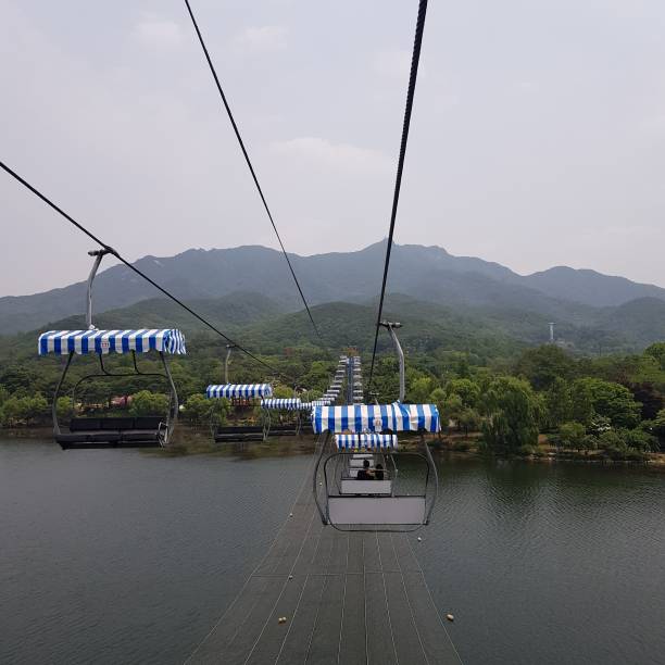 Beautiful view of blue and white cable cars at the zoo Seoul Grand Park, South Korea A beautiful view of blue and white cable cars at the zoo Seoul Grand Park, South Korea seoul zoo stock pictures, royalty-free photos & images
