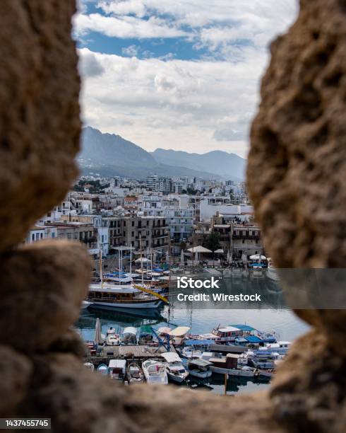 Scenic View Of A Historic Kyrenia Harbor Through Stone Window Of The Kyrenia Castle Stock Photo - Download Image Now