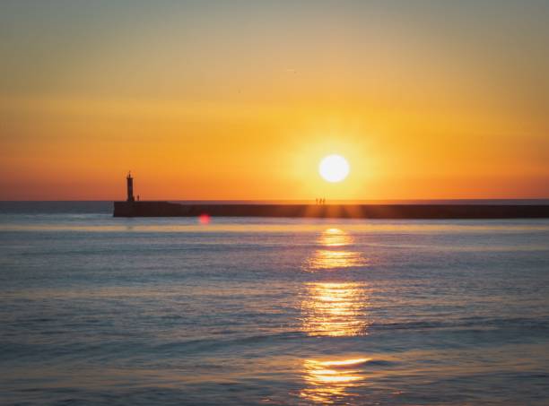 istock Amazing sunset at the beach 1437457265