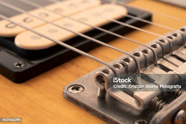 Detail Of The Bridge Saddles Of An Electric Guitar With Selective Focus Stock Photo - Download Image Now
