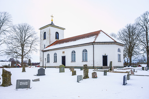Ullene, Sweden - February 15, 2021: Church in the country with snow