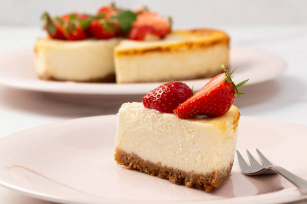 istock Slice of strawberry cheesecake on a white background 1437468317