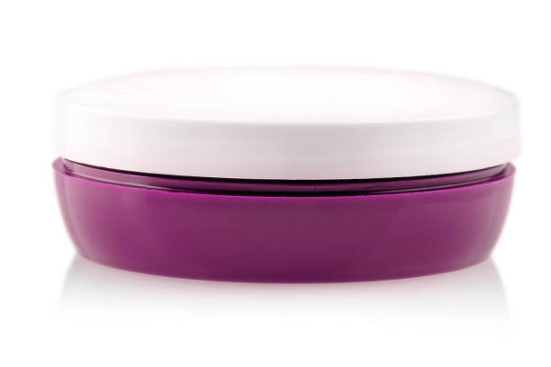 istock Closed jar with hand cream on white background 1437472119