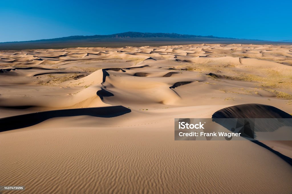 Sandwüste Sand dunes in the Gobi desert, Mongolia in the oblique light of the sun Accidents and Disasters Stock Photo